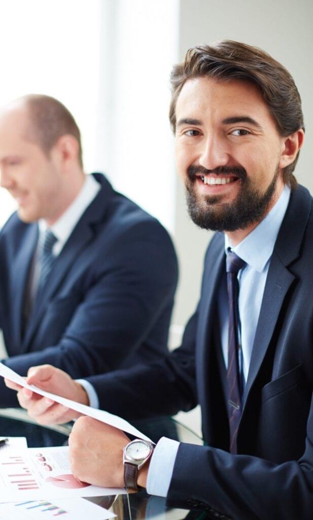 businessman-checking-document-scaled-e1760537852607